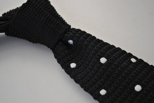 black skinny knitted tie with white polka dots